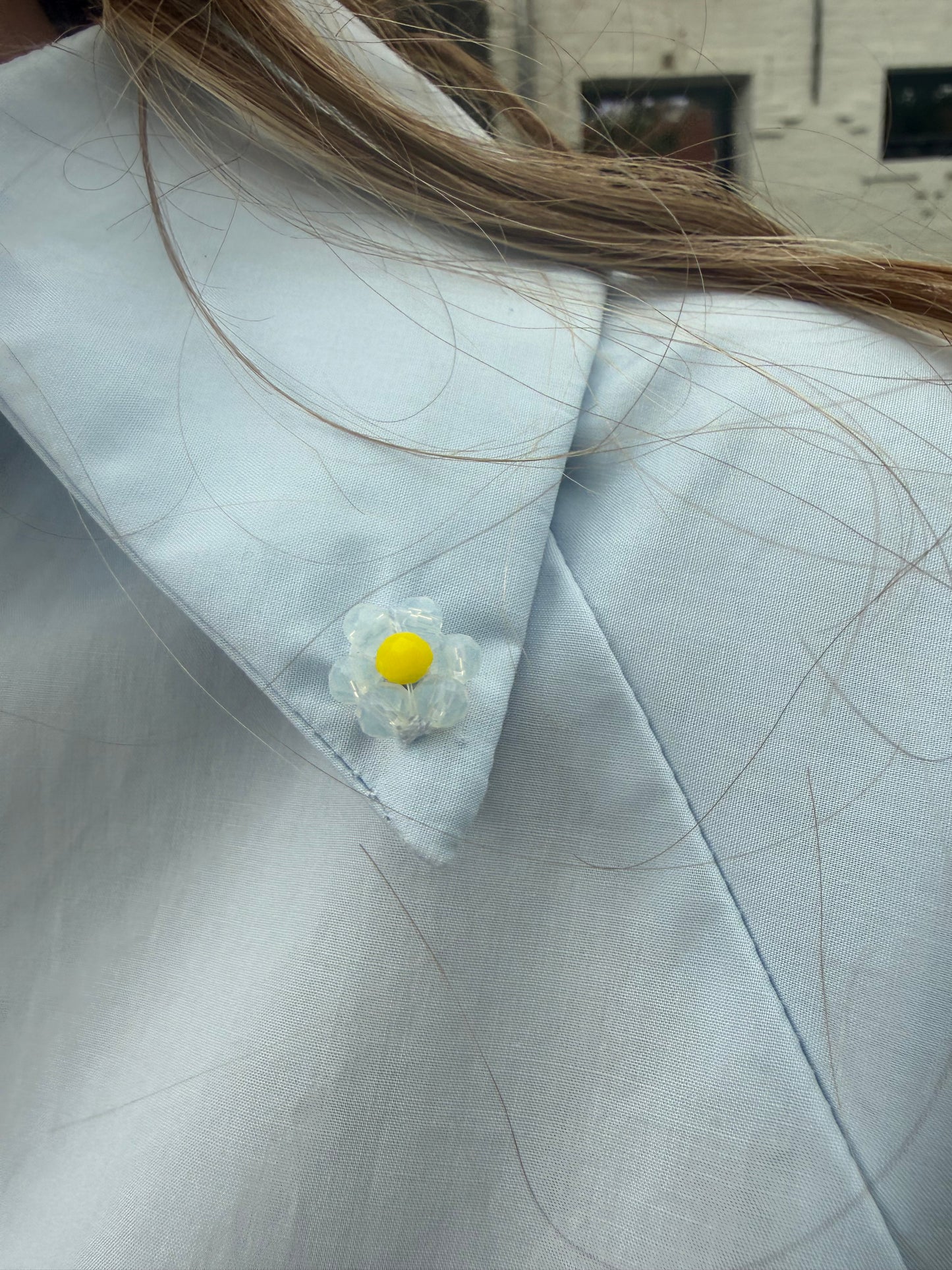 Blauwe blouse met ballonmouw & detailknopen