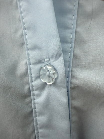 Blauwe blouse met ballonmouw & detailknopen
