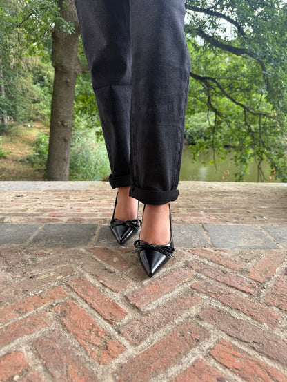 Zwarte pump strikje